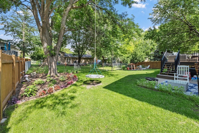 6502 Lancaster Ln N, Maple Grove, MN 55369 - fenced backyard featuring stairway and a wooden deck