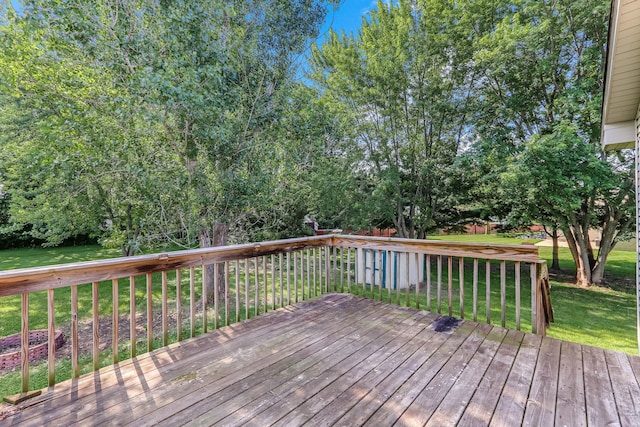 11883 Marigold Way, Lindstrom, MN 55045 - wooden deck featuring a lawn