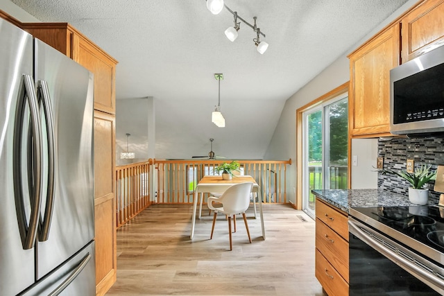 11883 Marigold Way, Lindstrom, MN 55045 - kitchen with stainless steel appliances, decorative backsplash, a ceiling fan, light wood finished floors, and a textured ceiling