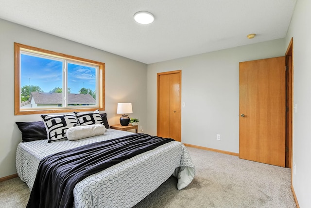 11883 Marigold Way, Lindstrom, MN 55045 - bedroom with light colored carpet and baseboards