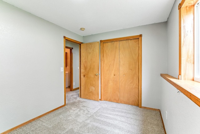 11883 Marigold Way, Lindstrom, MN 55045 - unfurnished bedroom with carpet floors and a closet
