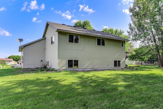 11883 Marigold Way, Lindstrom, MN 55045 - back of house featuring a yard