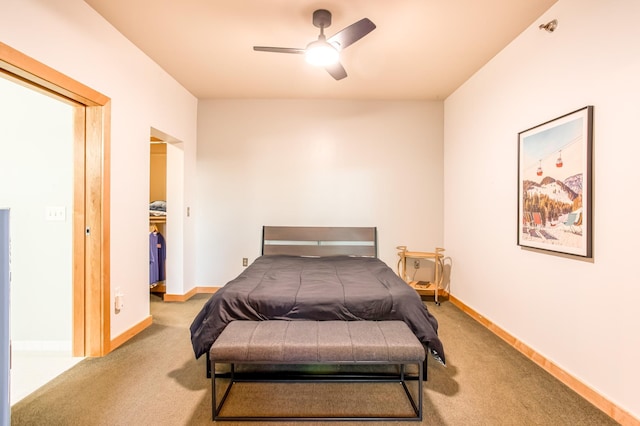 521 2nd St SE Unit 307, Minneapolis, MN 55414 - carpeted bedroom with a spacious closet and a ceiling fan