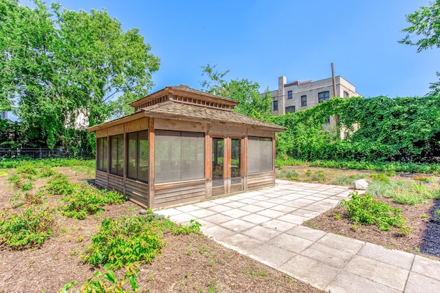 521 2nd St SE Unit 307, Minneapolis, MN 55414 - view of patio / terrace featuring a sunroom and a gazebo
