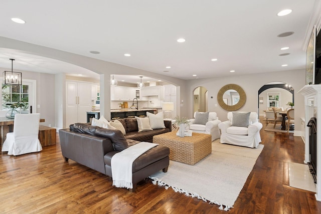 4622 Drexel Ave, Edina, MN 55424 - living room featuring wood finished floors, arched walkways, and recessed lighting