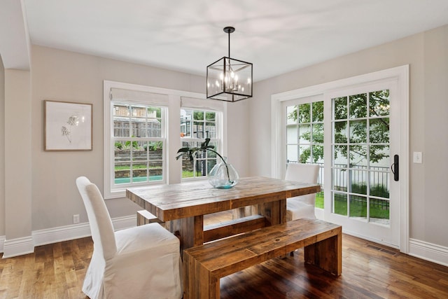 4622 Drexel Ave, Edina, MN 55424 - dining area with a chandelier and wood finished floors