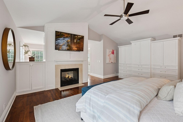 4622 Drexel Ave, Edina, MN 55424 - bedroom with dark wood-type flooring, vaulted ceiling, a high end fireplace, and a ceiling fan