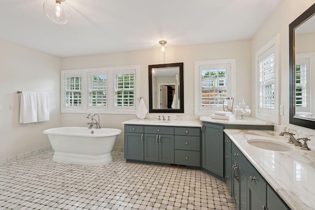 4622 Drexel Ave, Edina, MN 55424 - bathroom featuring two vanities and a freestanding tub