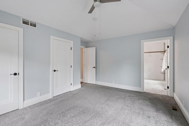 4622 Drexel Ave, Edina, MN 55424 - unfurnished bedroom featuring carpet, ensuite bath, and ceiling fan