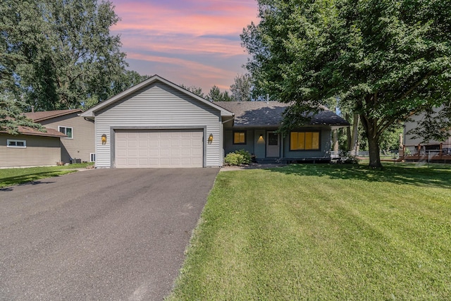 7230 Clear Rdg, Centerville, MN 55038 - ranch-style home with an attached garage, asphalt driveway, a lawn, and a shingled roof