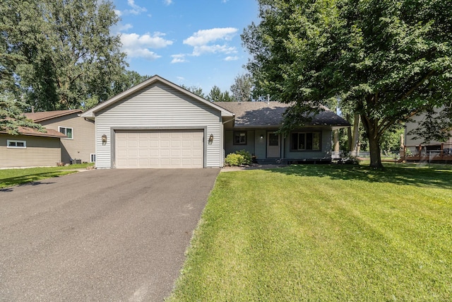 7230 Clear Rdg, Centerville, MN 55038 - single story home with driveway, an attached garage, a front lawn, and roof with shingles