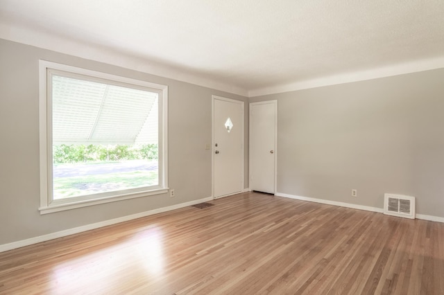 3708 Xenia Ave N, Crystal, MN 55422 - foyer with light wood-style flooring and baseboards