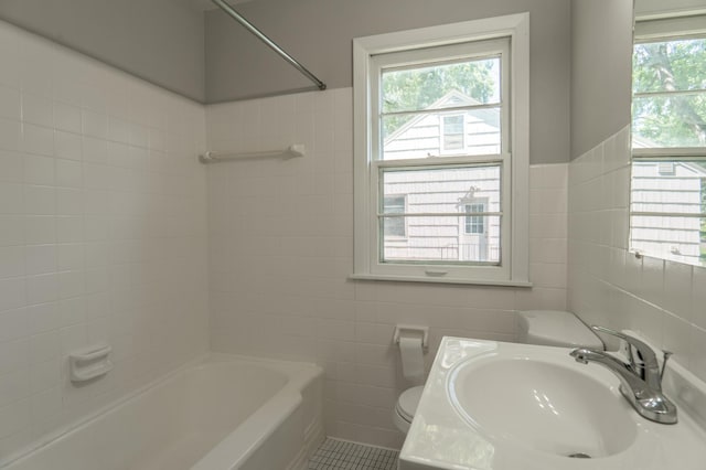 3708 Xenia Ave N, Crystal, MN 55422 - full bath featuring tile walls, washtub / shower combination, and vanity