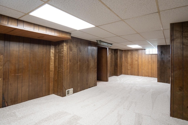 3708 Xenia Ave N, Crystal, MN 55422 - basement featuring carpet floors, a paneled ceiling, and wood walls
