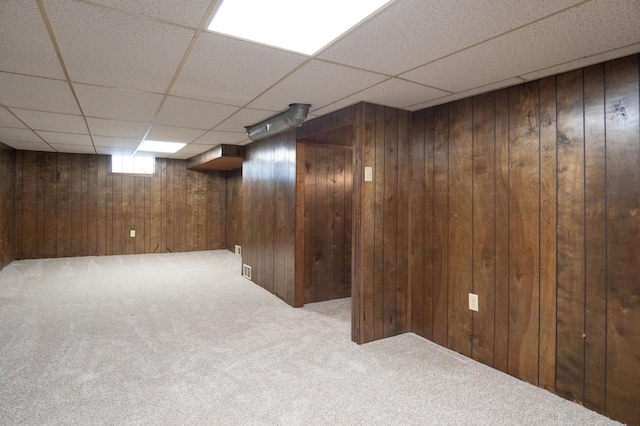 3708 Xenia Ave N, Crystal, MN 55422 - basement with carpet floors, wooden walls, and a drop ceiling