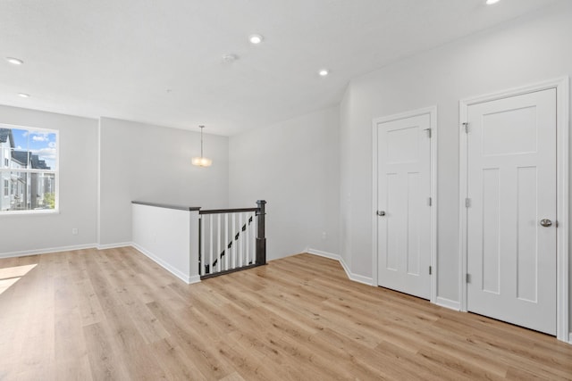 7614 Connie Ln, Inver Grove Heights, MN 55076 - unfurnished room featuring light wood-style flooring and recessed lighting