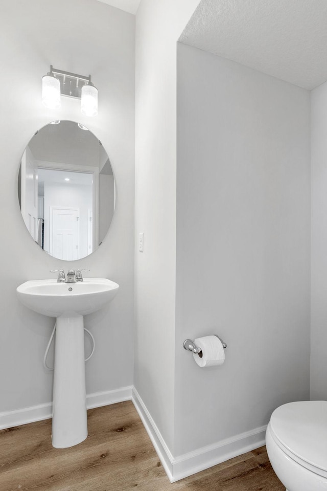 7614 Connie Ln, Inver Grove Heights, MN 55076 - half bathroom with wood finished floors