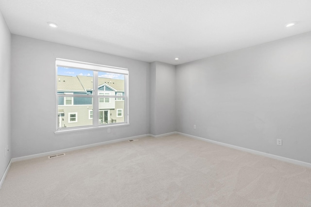 7614 Connie Ln, Inver Grove Heights, MN 55076 - spare room with light carpet and recessed lighting