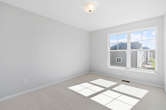 7614 Connie Ln, Inver Grove Heights, MN 55076 - unfurnished room with carpet flooring and baseboards