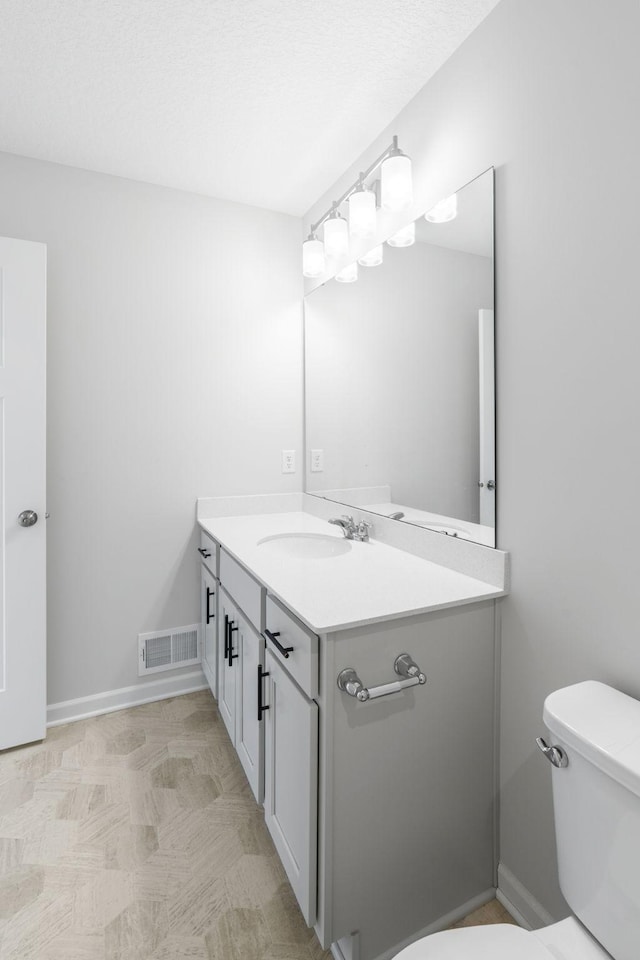 7614 Connie Ln, Inver Grove Heights, MN 55076 - bathroom with vanity and toilet