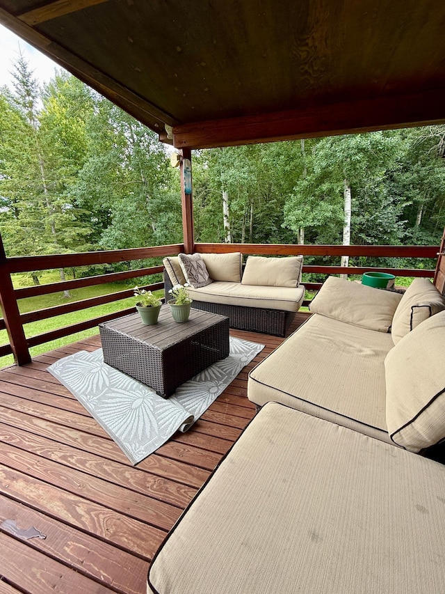 656 22nd Ave NW, Baudette Twp, MN 56623 - deck featuring outdoor lounge area and view of scattered trees