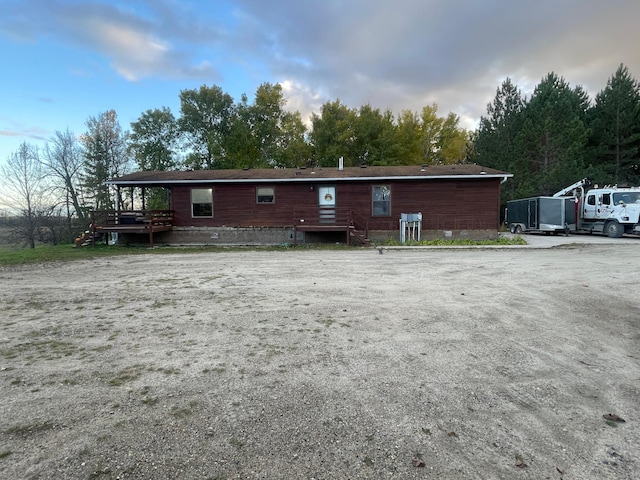 656 22nd Ave NW, Baudette Twp, MN 56623 - back of house with a wooden deck