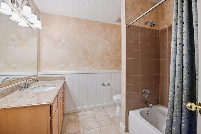 14170 Westridge Dr, Eden Prairie, MN 55347 - full bath featuring vanity, shower / tub combo, a wainscoted wall, and tile patterned flooring