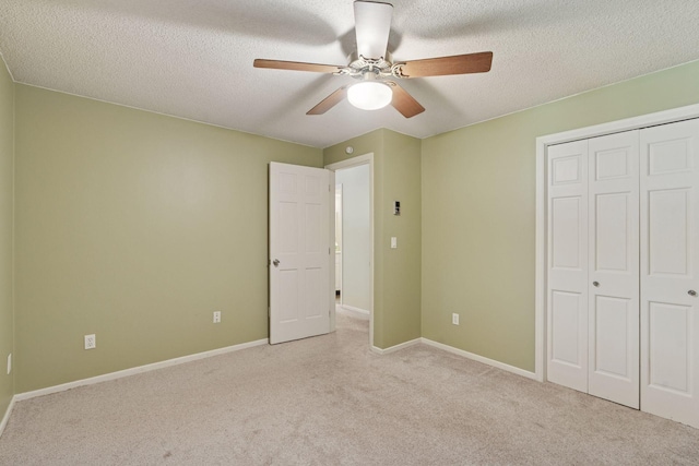 549 Vicki Ln, Shoreview, MN 55126 - unfurnished bedroom with carpet floors, a closet, a textured ceiling, and a ceiling fan