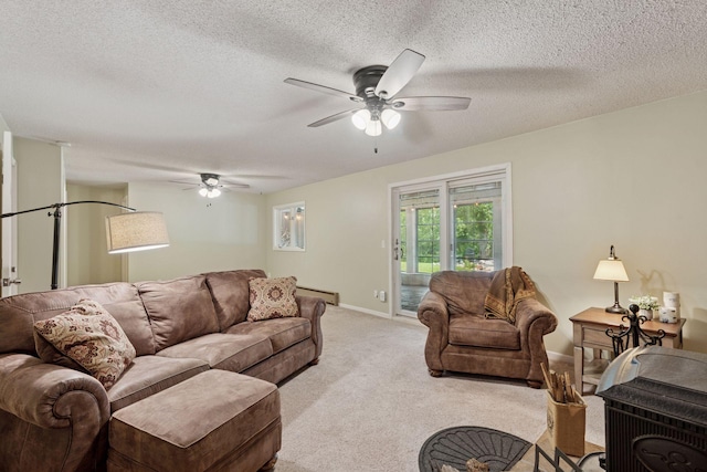 549 Vicki Ln, Shoreview, MN 55126 - living room featuring ceiling fan, light colored carpet, a baseboard radiator, and a textured ceiling