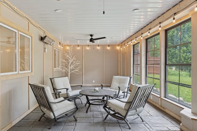 549 Vicki Ln, Shoreview, MN 55126 - sunroom featuring stone tile flooring and a ceiling fan