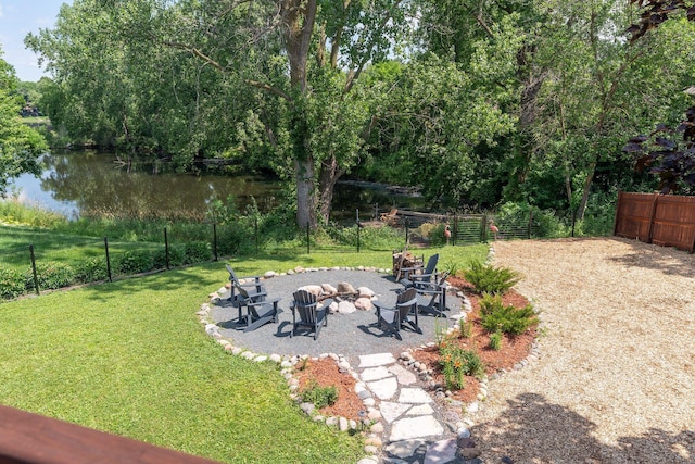 549 Vicki Ln, Shoreview, MN 55126 - view of yard featuring an outdoor fire pit and a water view