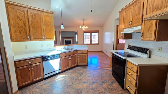 9136 Windsor Ter, Brooklyn Park, MN 55443 - kitchen featuring black range with electric cooktop, white dishwasher, under cabinet range hood, brown cabinetry, and decorative backsplash