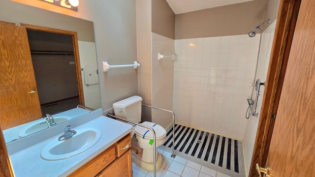 9136 Windsor Ter, Brooklyn Park, MN 55443 - bathroom with tiled shower, tile patterned flooring, and vanity