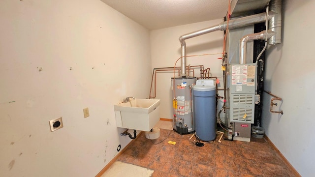 9136 Windsor Ter, Brooklyn Park, MN 55443 - utility room featuring gas water heater and a sink