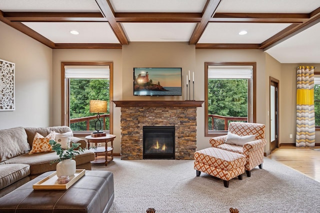 7461 Merrimac Ln N, Maple Grove, MN 55311 - living area featuring coffered ceiling, beam ceiling, a stone fireplace, recessed lighting, and carpet floors