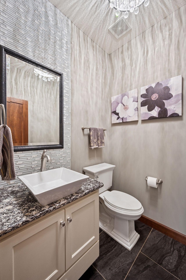 7461 Merrimac Ln N, Maple Grove, MN 55311 - bathroom with vanity, backsplash, and tile patterned flooring