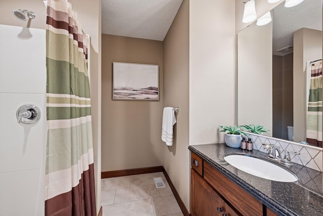 7461 Merrimac Ln N, Maple Grove, MN 55311 - full bath featuring a textured ceiling, vanity, a shower with shower curtain, and tile patterned flooring