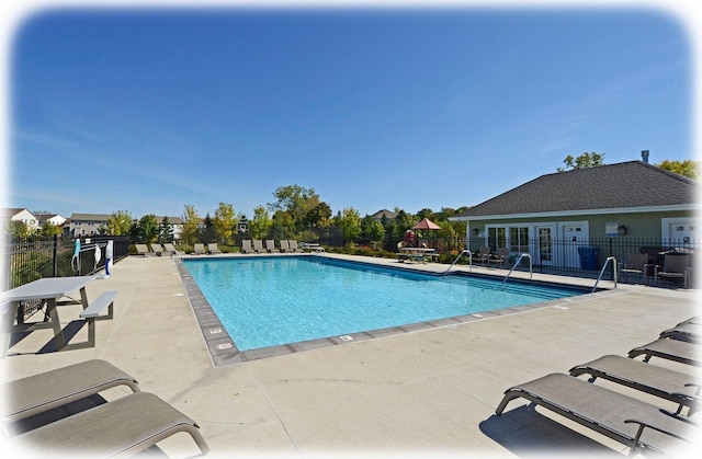 7461 Merrimac Ln N, Maple Grove, MN 55311 - community pool with a patio
