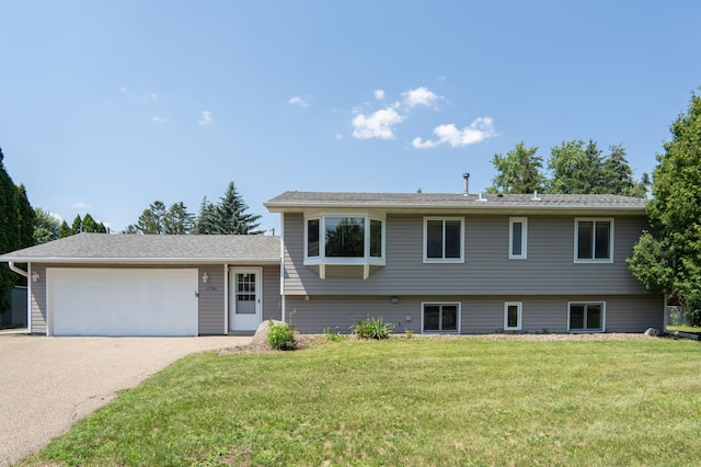 1781 Taconite Pt, Eagan, MN 55122 - tri-level home featuring a front yard, an attached garage, and driveway