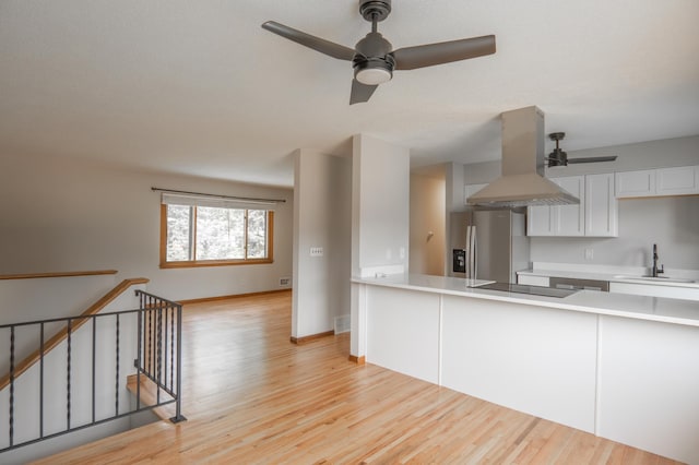 1781 Taconite Pt, Eagan, MN 55122 - kitchen featuring extractor fan, stainless steel refrigerator with ice dispenser, a ceiling fan, and light wood-style flooring