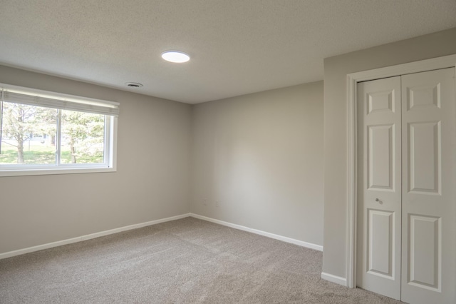 1781 Taconite Pt, Eagan, MN 55122 - unfurnished room with carpet flooring and a textured ceiling