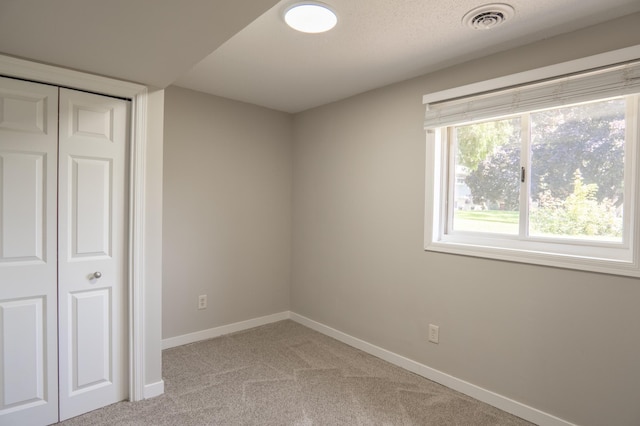 1781 Taconite Pt, Eagan, MN 55122 - unfurnished bedroom featuring light colored carpet and a closet