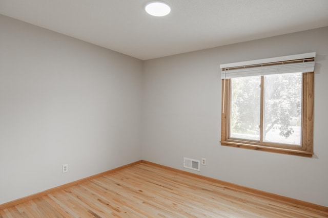 1781 Taconite Pt, Eagan, MN 55122 - empty room with wood finished floors and plenty of natural light