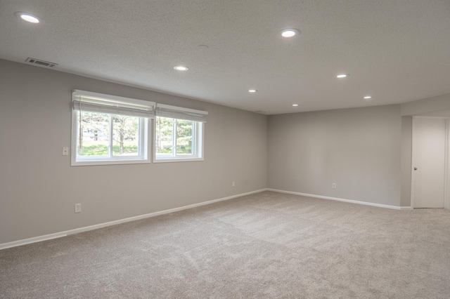 1781 Taconite Pt, Eagan, MN 55122 - unfurnished room featuring light carpet and recessed lighting
