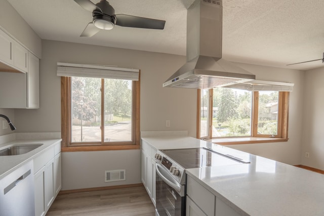 1781 Taconite Pt, Eagan, MN 55122 - kitchen featuring electric range, dishwashing machine, island exhaust hood, a ceiling fan, and a textured ceiling