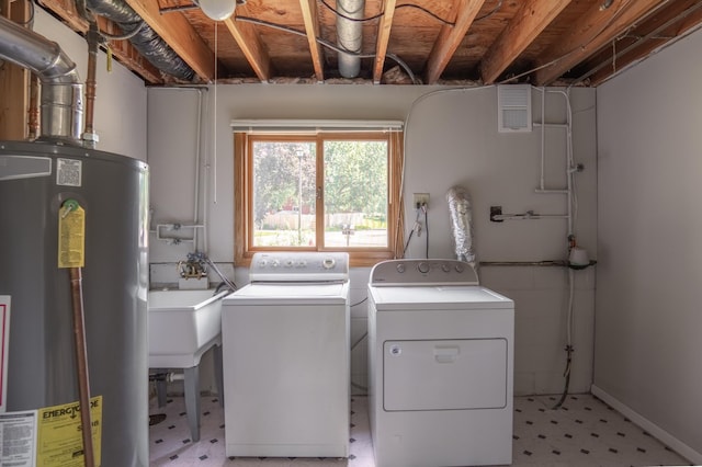 1781 Taconite Pt, Eagan, MN 55122 - washroom featuring gas water heater, light flooring, and washing machine and clothes dryer
