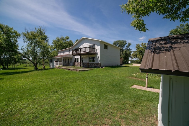 43724 County Highway 19, Blowers Twp, MN 56477 - view of green lawn with a deck