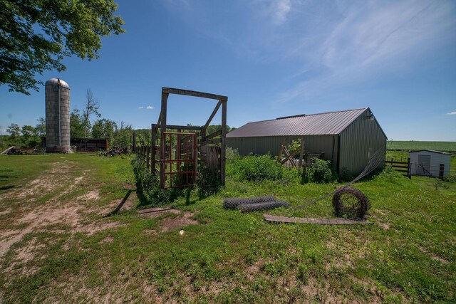 43724 County Highway 19, Blowers Twp, MN 56477 - view of green lawn with an outbuilding and a pole building