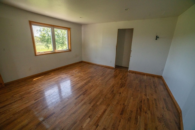 43724 County Highway 19, Blowers Twp, MN 56477 - unfurnished room featuring wood finished floors and baseboards