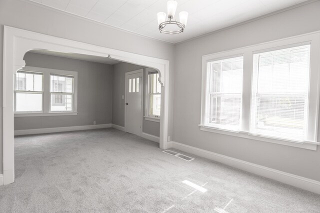 4020 Emerson Ave N, Minneapolis, MN 55412 - spare room featuring carpet and a chandelier